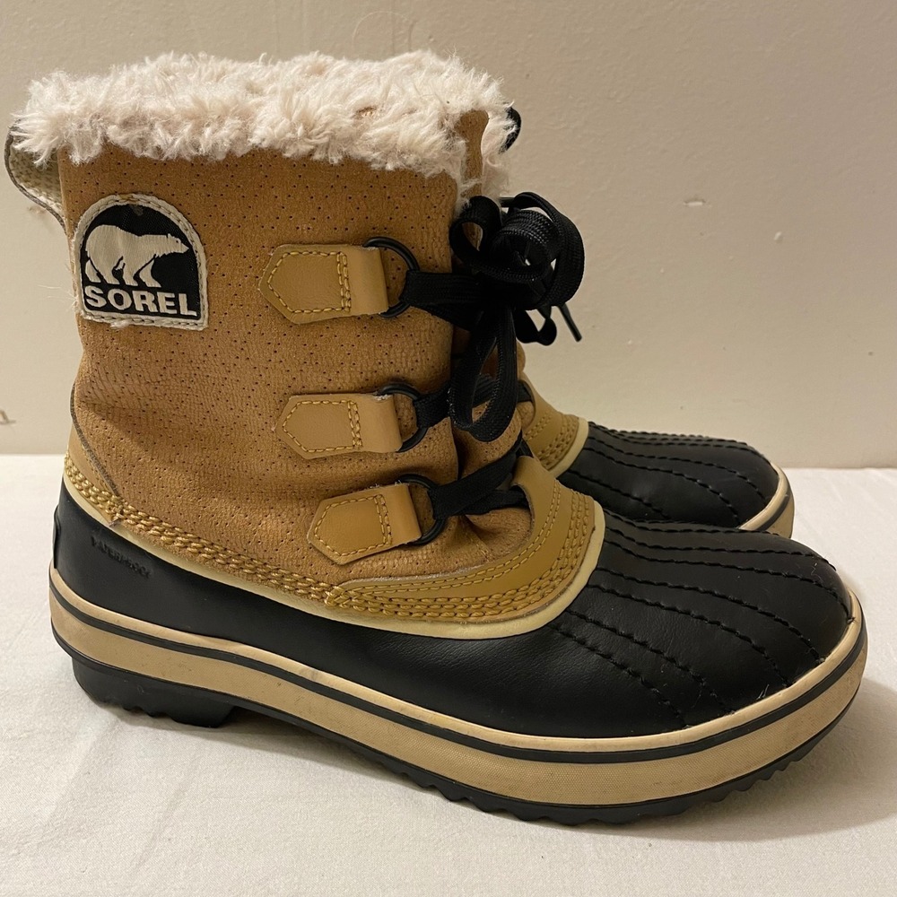 Sorel Tan and Black Snow Boots